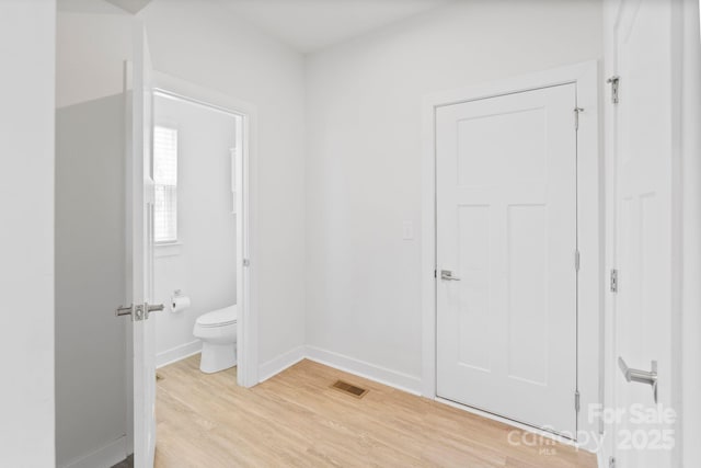 207 Welcombe St, Mooresville, NC 28115 - unfurnished bedroom with light wood-style flooring, baseboards, and ensuite bath