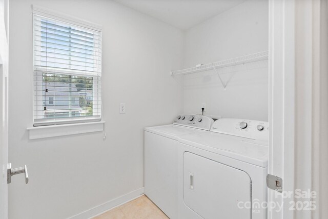 207 Welcombe St, Mooresville, NC 28115 - laundry room featuring washer and dryer, baseboards, and light tile patterned floors