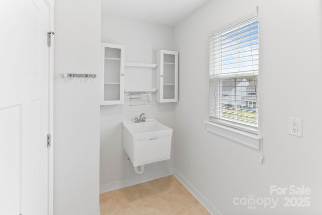 207 Welcombe St, Mooresville, NC 28115 - walk in closet featuring a sink and light tile patterned floors