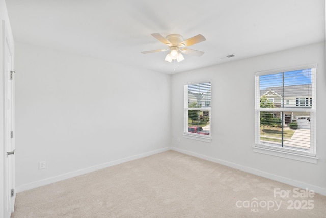207 Welcombe St, Mooresville, NC 28115 - empty room featuring light carpet, baseboards, and ceiling fan
