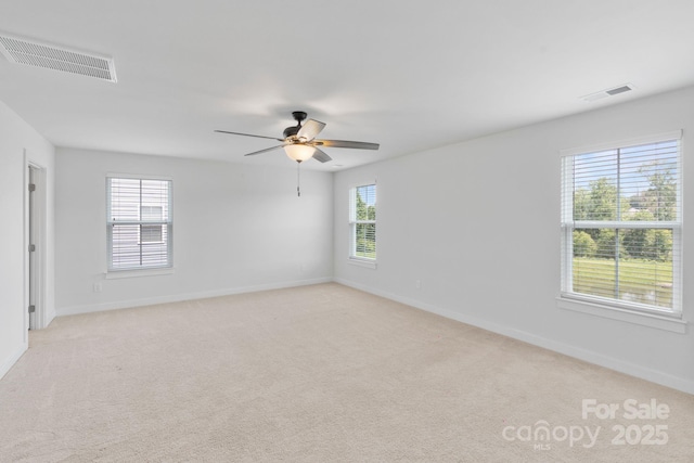 207 Welcombe St, Mooresville, NC 28115 - unfurnished room featuring baseboards, ceiling fan, and light carpet