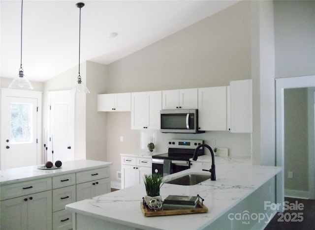 1802 Cooper Ave, Kannapolis, NC 28081 - kitchen featuring stainless steel microwave, a sink, lofted ceiling, white cabinetry, and light stone countertops
