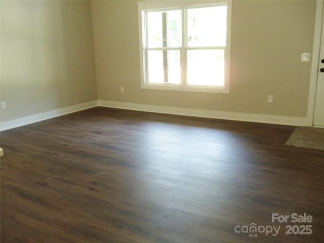 1802 Cooper Ave, Kannapolis, NC 28081 - empty room featuring dark wood-style flooring and baseboards
