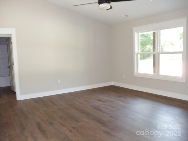 1802 Cooper Ave, Kannapolis, NC 28081 - spare room with ceiling fan, dark wood-type flooring, and baseboards