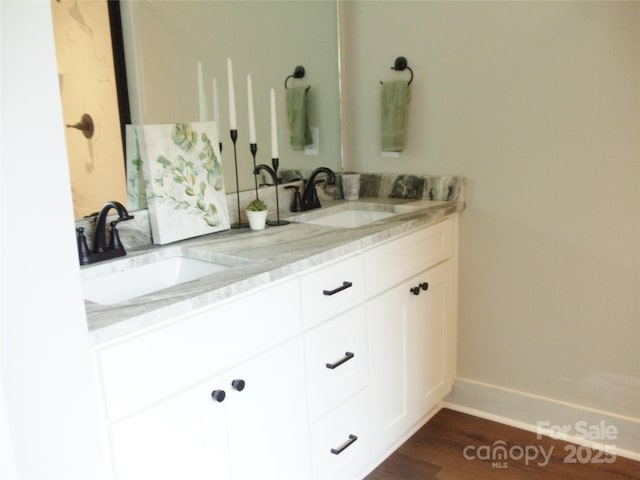 1802 Cooper Ave, Kannapolis, NC 28081 - full bath with double vanity, baseboards, and wood finished floors