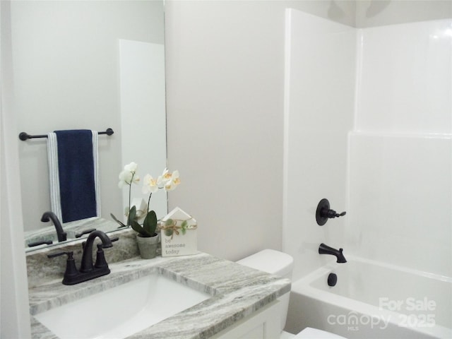 1802 Cooper Ave, Kannapolis, NC 28081 - bathroom featuring vanity, toilet, and bathtub / shower combination