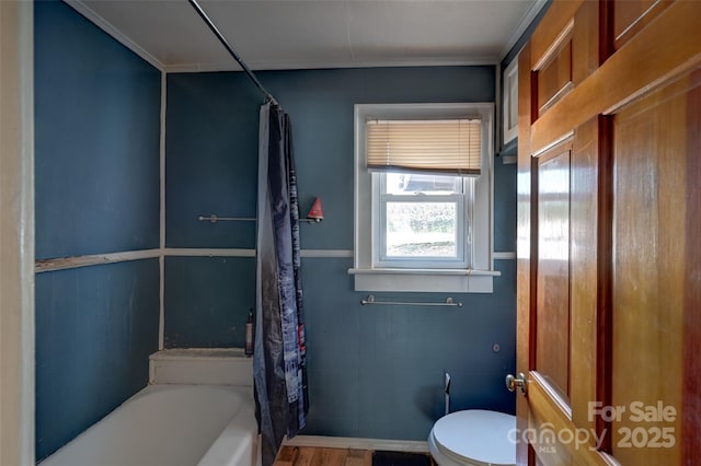 3960 Old Clyde Rd, Clyde, NC 28721 - bathroom featuring toilet, shower / bathtub combination with curtain, ornamental molding, tile walls, and wood finished floors