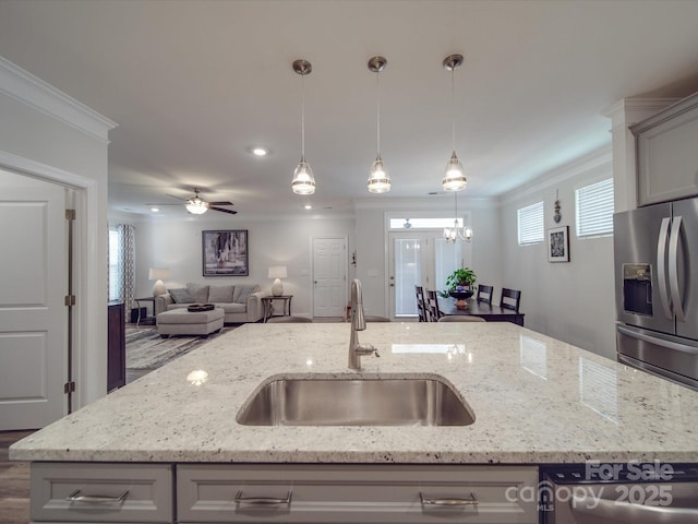 647 R L Stowe Rd, Belmont, NC 28012 - kitchen featuring stainless steel appliances, a sink, gray cabinets, an island with sink, and open floor plan
