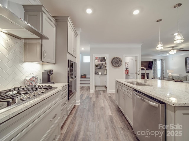 647 R L Stowe Rd, Belmont, NC 28012 - kitchen featuring appliances with stainless steel finishes, a sink, wall chimney exhaust hood, decorative backsplash, and crown molding