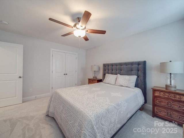 647 R L Stowe Rd, Belmont, NC 28012 - bedroom featuring carpet flooring, a closet, baseboards, and a ceiling fan