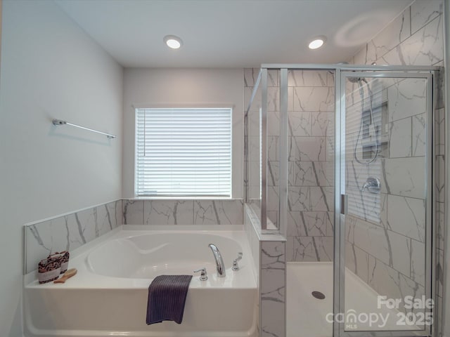 647 R L Stowe Rd, Belmont, NC 28012 - bathroom featuring a garden tub, a shower stall, and recessed lighting
