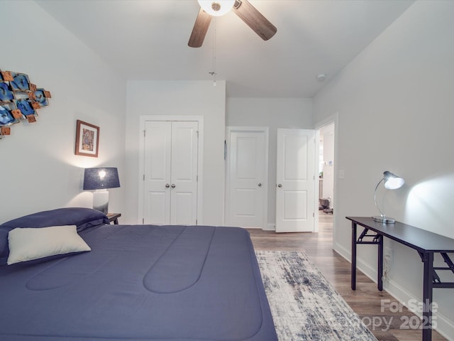 647 R L Stowe Rd, Belmont, NC 28012 - bedroom featuring wood finished floors, baseboards, a closet, and ceiling fan