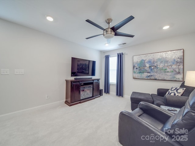 647 R L Stowe Rd, Belmont, NC 28012 - living room featuring a ceiling fan, light carpet, baseboards, and recessed lighting