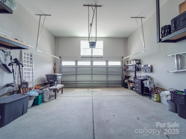 647 R L Stowe Rd, Belmont, NC 28012 - garage featuring a garage door opener