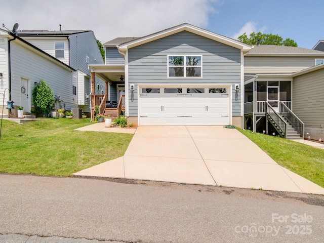 647 R L Stowe Rd, Belmont, NC 28012 - view of front of home featuring a front yard, driveway, stairway, and a sunroom