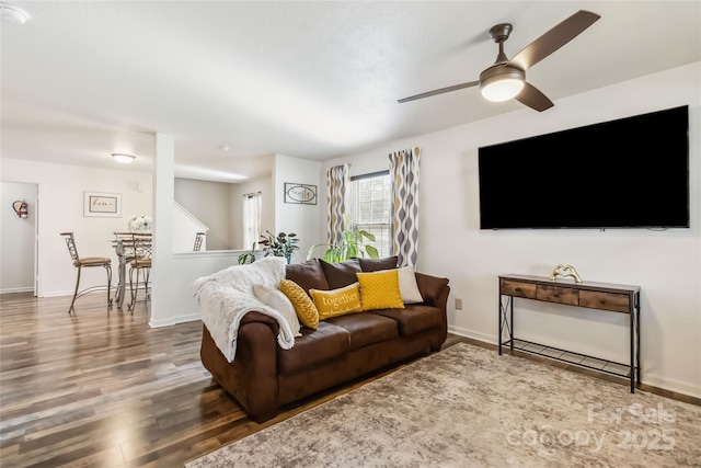 925 Skywatch Ln, Monroe, NC 28112 - living room featuring wood finished floors, ceiling fan, and baseboards