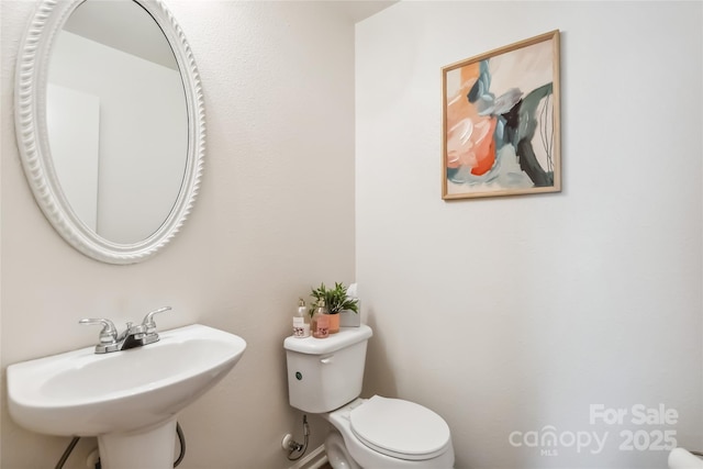 925 Skywatch Ln, Monroe, NC 28112 - bathroom with toilet and a sink