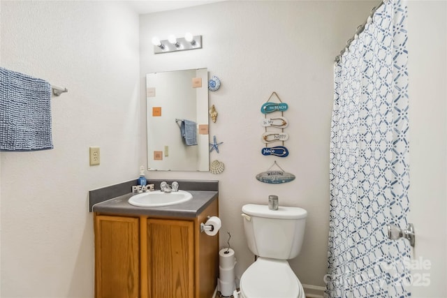 925 Skywatch Ln, Monroe, NC 28112 - bathroom with vanity, toilet, and a shower with curtain