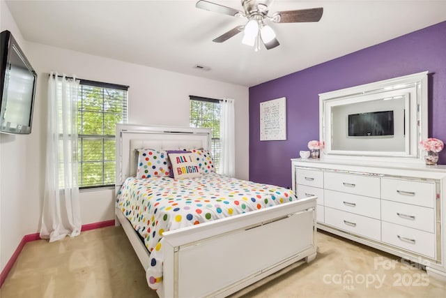 925 Skywatch Ln, Monroe, NC 28112 - bedroom with light colored carpet, baseboards, and a ceiling fan