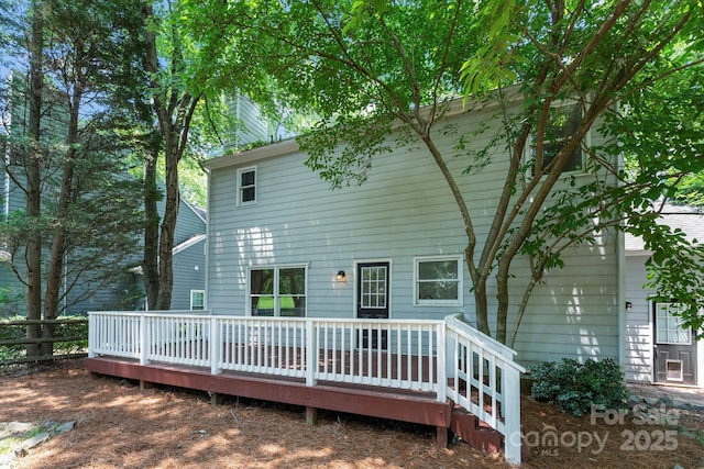 9513 Saddle Run Trl, Charlotte, NC 28269 - back of house with a deck