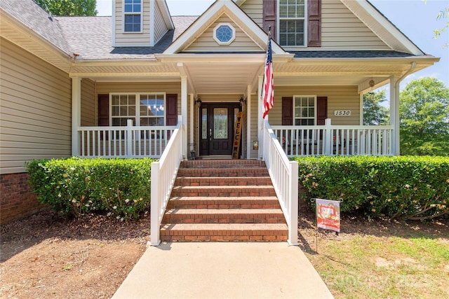 1530 Danlee Dr, Lancaster, SC 29720 - view of exterior entry with covered porch and a shingled roof
