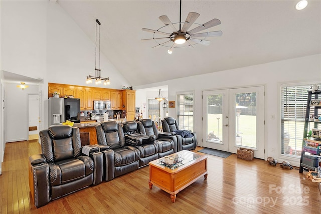 1530 Danlee Dr, Lancaster, SC 29720 - living area featuring a ceiling fan, high vaulted ceiling, light wood finished floors, and french doors