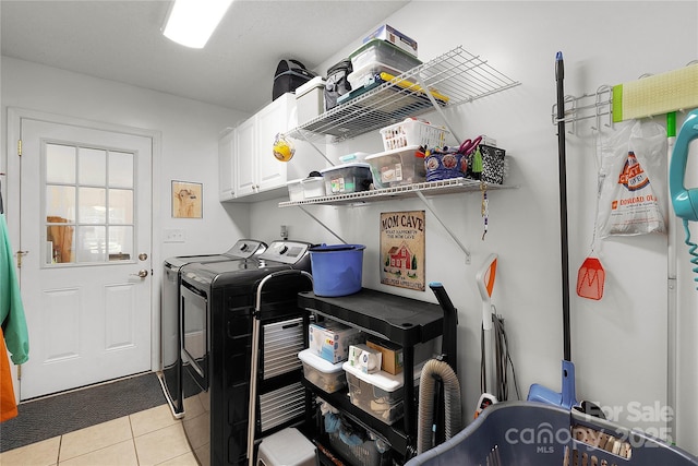 1530 Danlee Dr, Lancaster, SC 29720 - laundry room featuring cabinet space, independent washer and dryer, and light tile patterned flooring