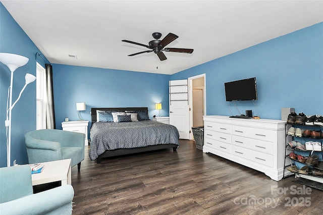 7434 Dover Mill Ln SW, Concord, NC 28025 - bedroom featuring dark wood-style flooring and a ceiling fan