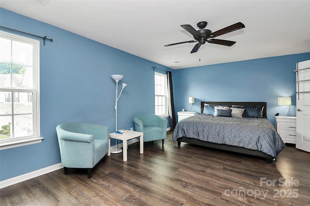 7434 Dover Mill Ln SW, Concord, NC 28025 - bedroom featuring wood finished floors, baseboards, and a ceiling fan