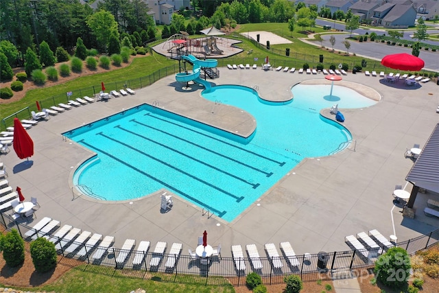 7434 Dover Mill Ln SW, Concord, NC 28025 - community pool with a water slide and a patio
