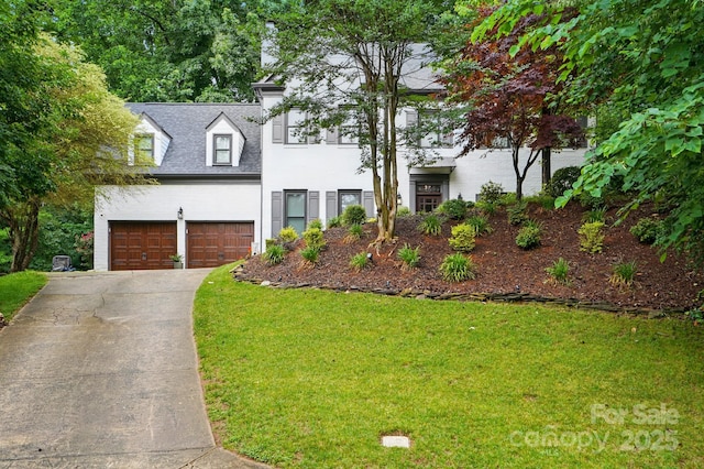 8708 Piccone Brook Ln, Charlotte, NC 28216 - view of front of property with driveway, brick siding, a front lawn, an attached garage, and a shingled roof