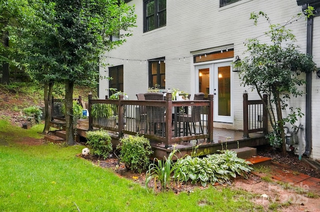 8708 Piccone Brook Ln, Charlotte, NC 28216 - back of property with a wooden deck and a yard