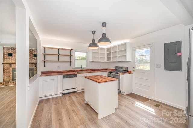 3595 Mt Holly Rd, Edgemoor, SC 29712 - kitchen featuring butcher block countertops, white dishwasher, open shelves, a sink, and stainless steel range with gas cooktop