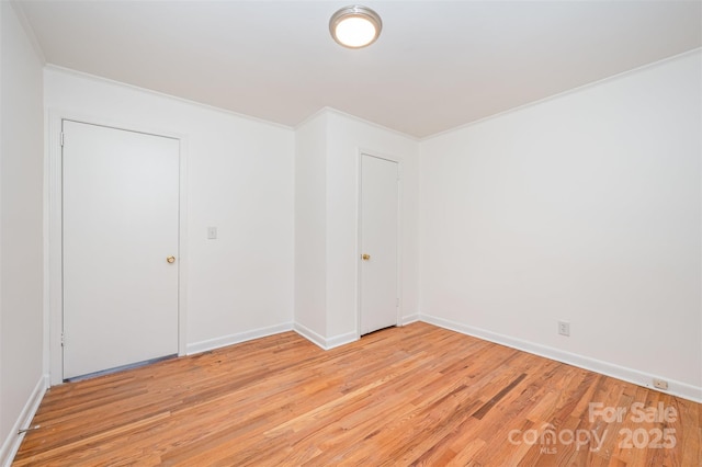 3595 Mt Holly Rd, Edgemoor, SC 29712 - empty room featuring light wood-type flooring, crown molding, and baseboards