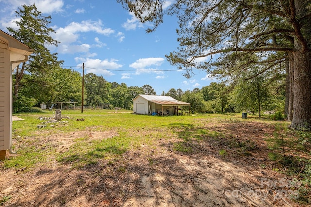 3595 Mt Holly Rd, Edgemoor, SC 29712 - view of yard with an outdoor structure and a pole building