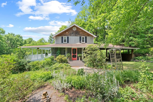 20 Pickens Ln, Weaverville, NC 28787 - farmhouse-style home featuring a porch and board and batten siding