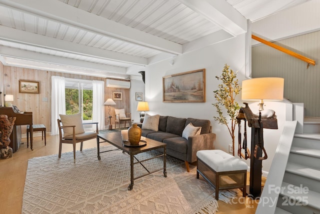 20 Pickens Ln, Weaverville, NC 28787 - living area featuring light wood-type flooring, a wall mounted AC, beam ceiling, and wood walls