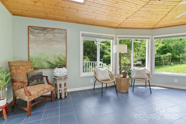20 Pickens Ln, Weaverville, NC 28787 - sitting room with healthy amount of natural light, wooden ceiling, dark tile patterned floors, and baseboards