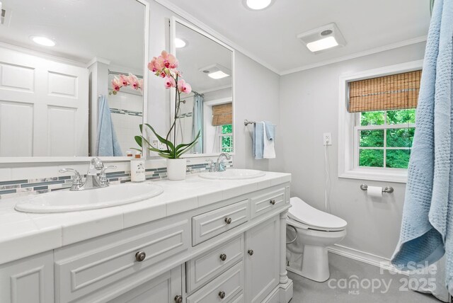20 Pickens Ln, Weaverville, NC 28787 - full bath featuring double vanity, toilet, crown molding, a shower with shower curtain, and recessed lighting