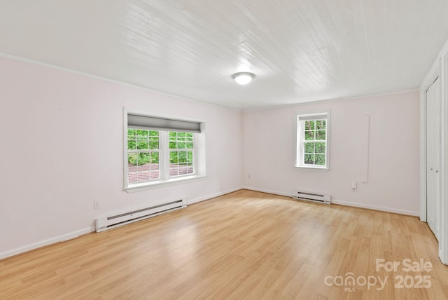 20 Pickens Ln, Weaverville, NC 28787 - spare room with a baseboard radiator, wood finished floors, ornamental molding, and baseboards