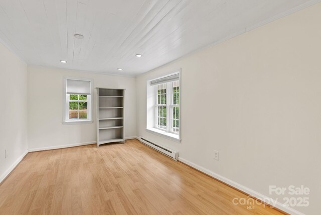 20 Pickens Ln, Weaverville, NC 28787 - empty room with a baseboard radiator, light wood-type flooring, baseboards, recessed lighting, and ornamental molding