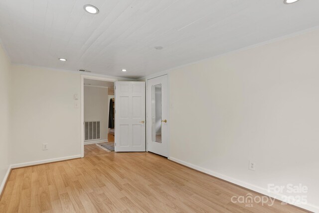 20 Pickens Ln, Weaverville, NC 28787 - unfurnished room featuring baseboards, recessed lighting, ornamental molding, and light wood-style floors