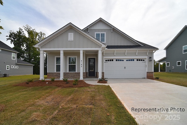 4178 Millstream Rd, Denver, NC 28037 - craftsman-style house with board and batten siding, concrete driveway, a porch, a garage, and a front lawn