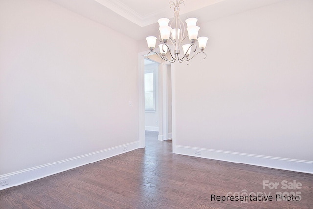 4178 Millstream Rd, Denver, NC 28037 - empty room with dark wood-style flooring, a chandelier, baseboards, and crown molding