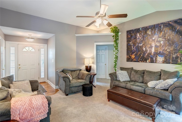 1209 Danielle Downs Ct SE, Concord, NC 28025 - carpeted living room featuring ceiling fan, lofted ceiling, and baseboards