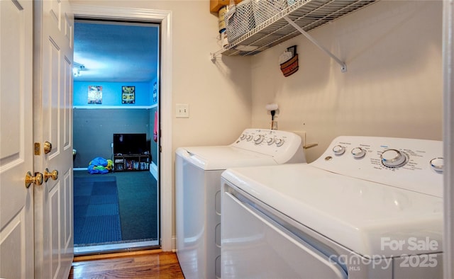 1209 Danielle Downs Ct SE, Concord, NC 28025 - laundry area featuring washer and clothes dryer and wood finished floors