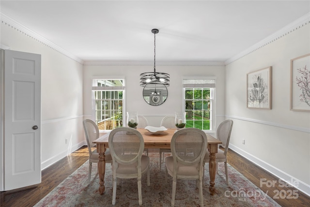 7213 Lancer Dr, Charlotte, NC 28226 - dining area with dark wood finished floors, ornamental molding, and baseboards