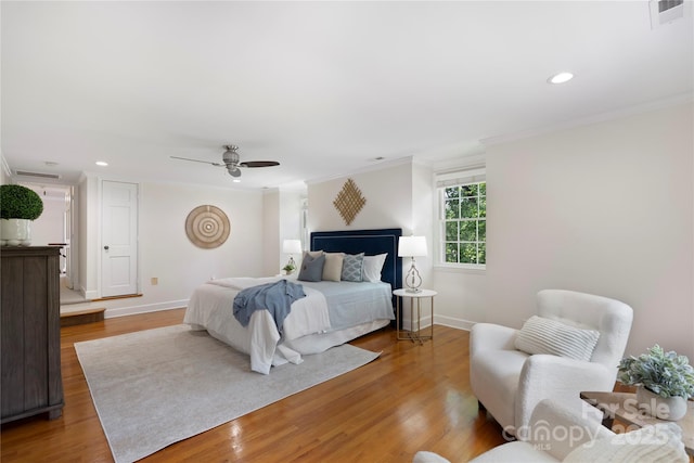 7213 Lancer Dr, Charlotte, NC 28226 - bedroom with crown molding, baseboards, wood finished floors, recessed lighting, and ceiling fan