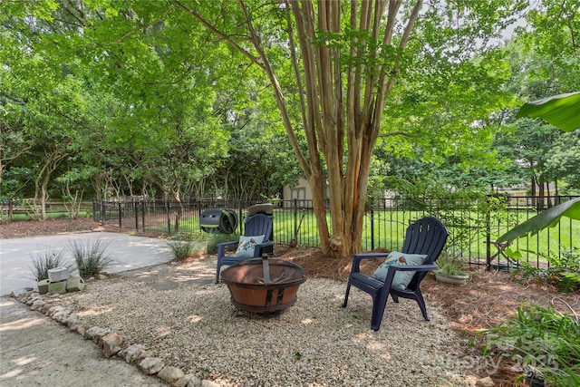7213 Lancer Dr, Charlotte, NC 28226 - view of yard with an outdoor fire pit and a patio area