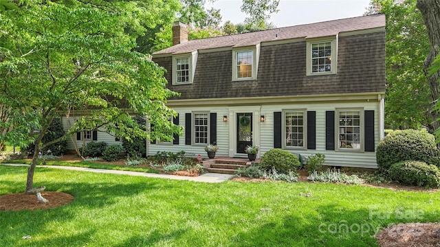 7213 Lancer Dr, Charlotte, NC 28226 - dutch colonial with roof with shingles, a front yard, a chimney, and a gambrel roof